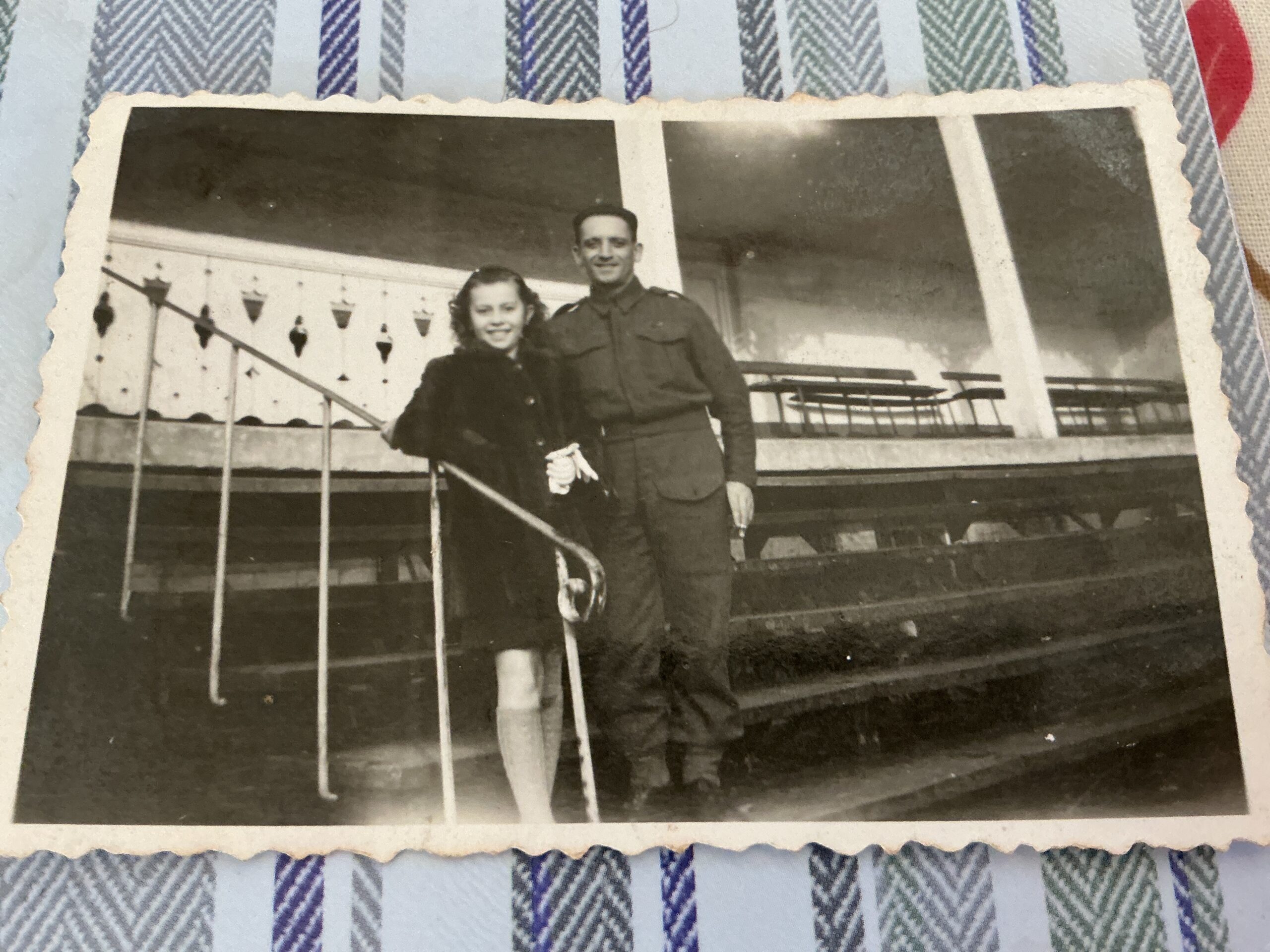 Man and girl standing on steps