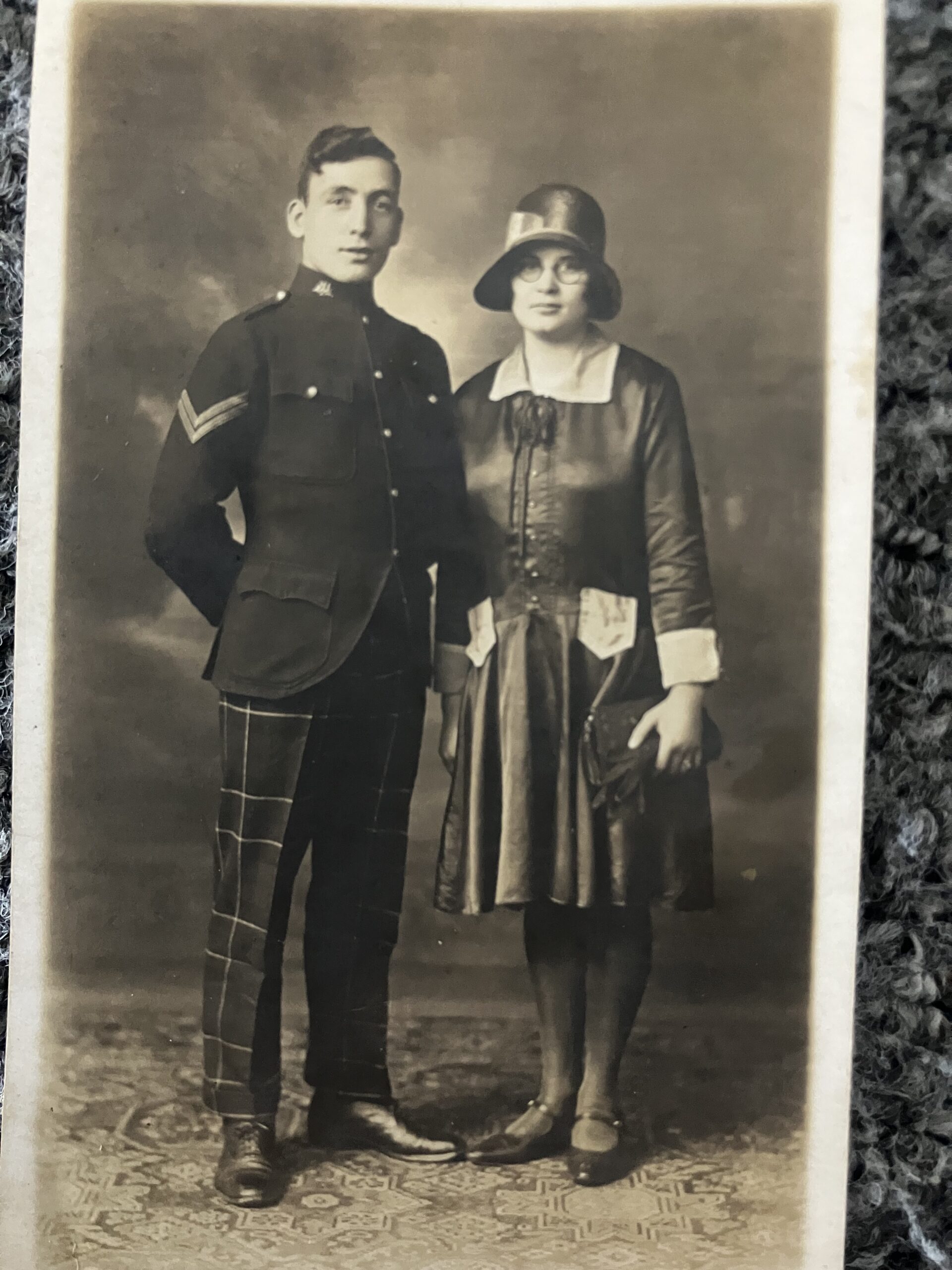 Photo of a man in uniform with a woman