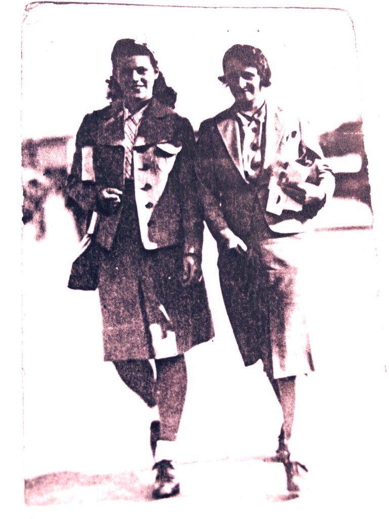 Dorothy and Corinne with gasmasks on WSM promenade 1941