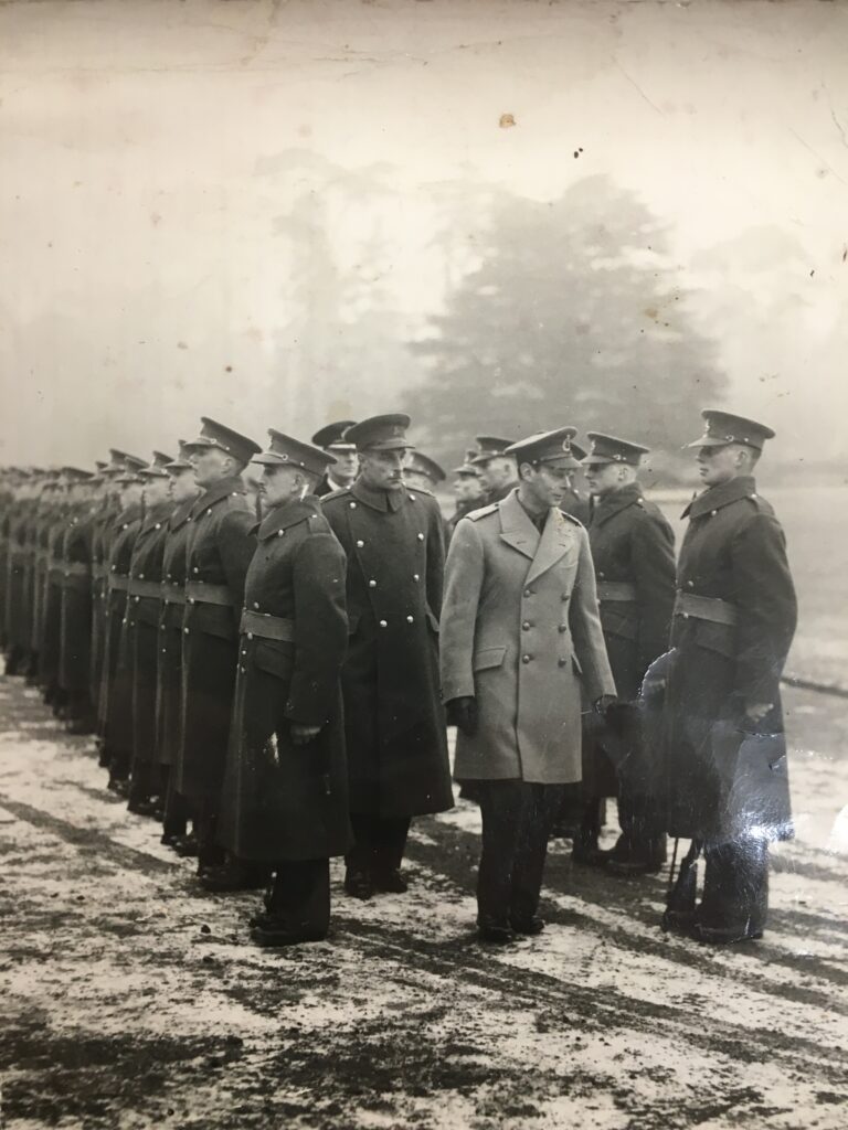 King inspecting regiment